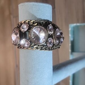 Fossil brand clear crystal bracelet with charms toggle closure brass colored